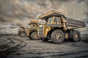 coal trucks stand ready to extract minerals