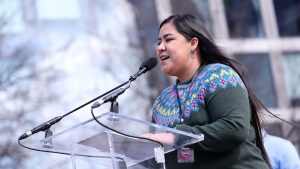 farmworker and community organizer Marielena Vega speaks to a crowd a the rally for resilience in washington dc