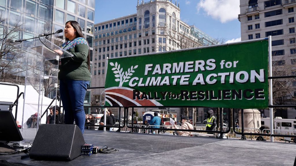 farmworker and community organizer Marielena Vega speaks to a crowd a the rally for resilience in washington dc