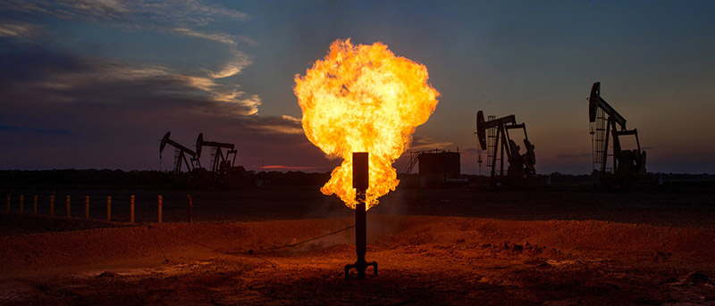 methane flare near oil wells