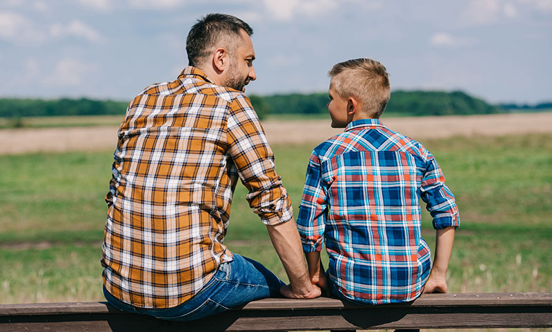 father and son ranchers